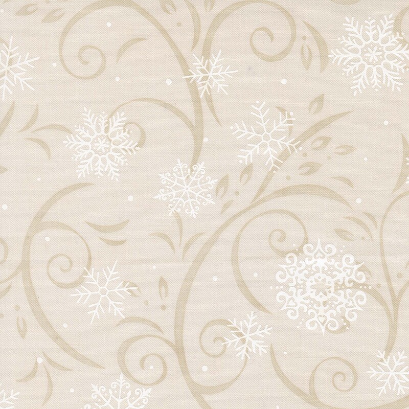 Beige fabric with tan flourishes and white snowflakes