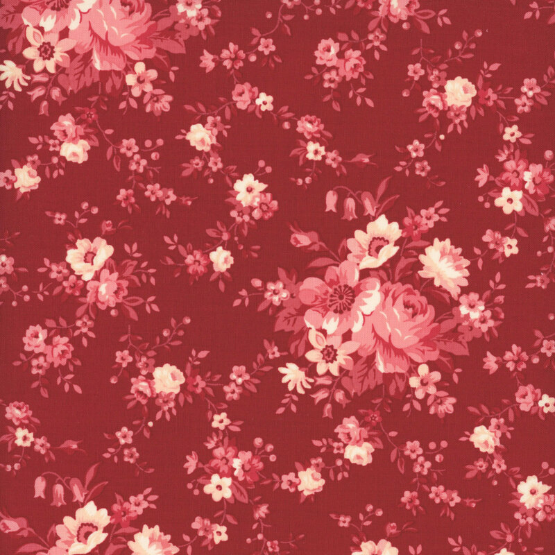 A crimson fabric with a shabby pattern of muted vines, roses, and pink flowers in shades of muted pink.