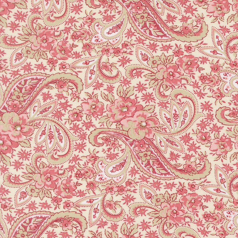 An ivory fabric with a sage green and rosy pink floral paisley design