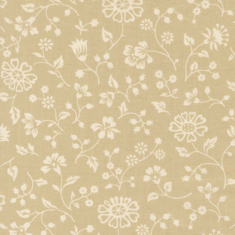 Almond tan fabric with a spaced pattern of light cream beige florals and vines