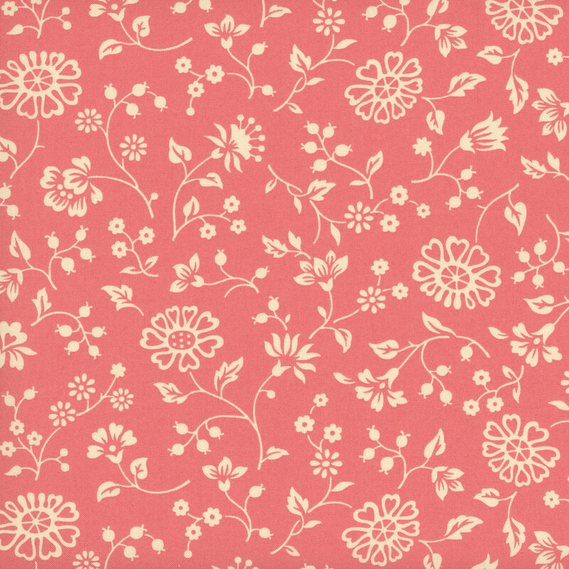 Coral fabric with a spaced pattern of light cream beige florals and vines.