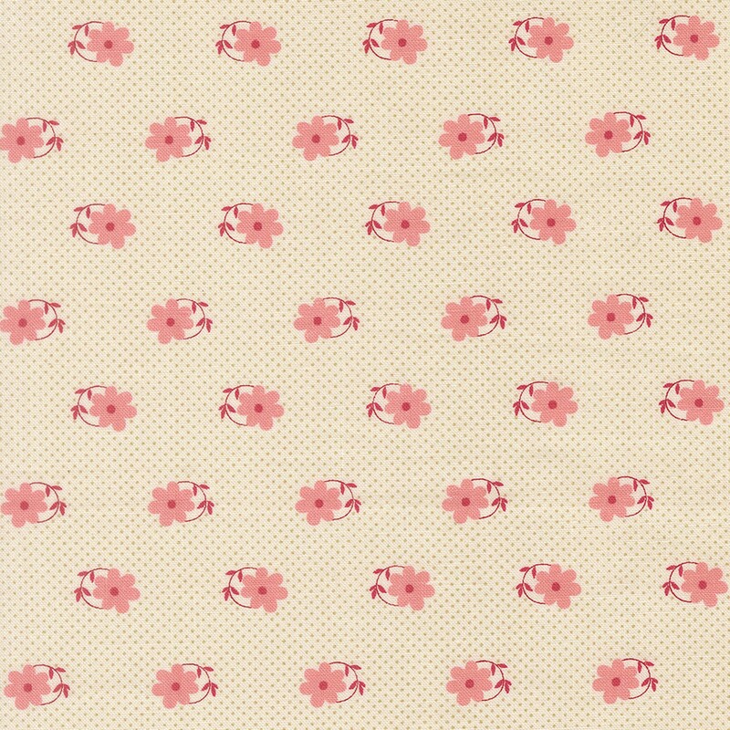 Cream beige fabric patterned with tiny tan pin-dots and pink daisies with magenta circular stems