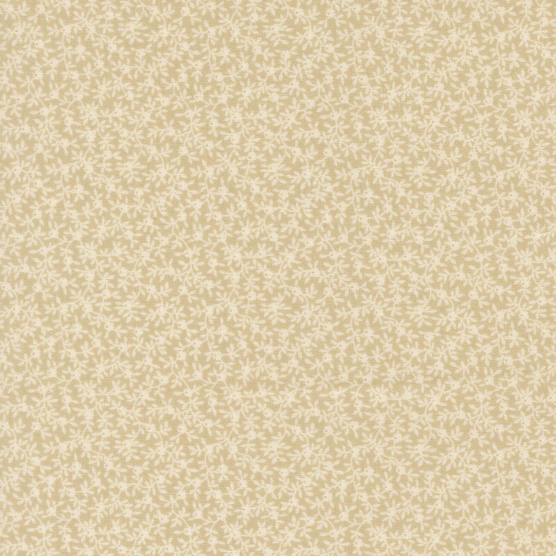 Tan fabric with a dense pattern of beige vines and flowers