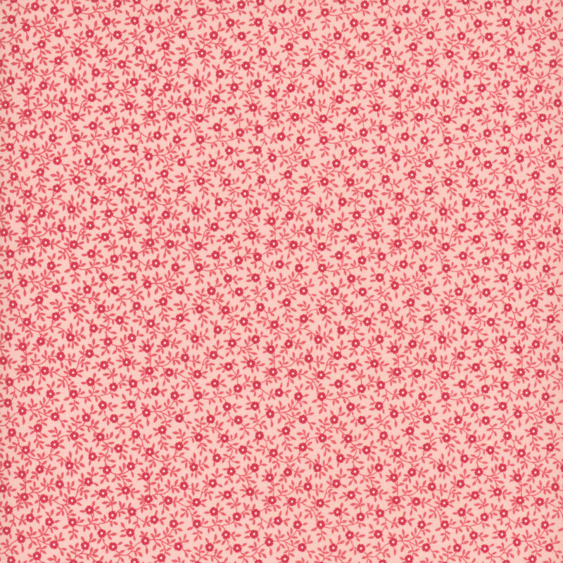 Coral fabric with a dense pattern of pink and magenta vines and flowers.