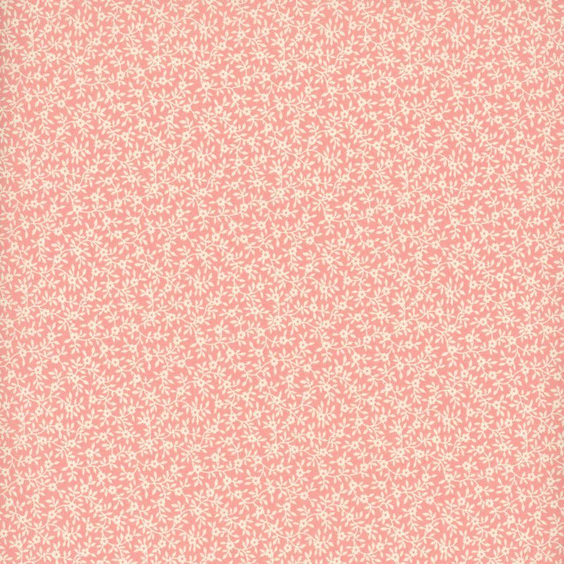Blush pink fabric with a dense pattern of white vines and flowers