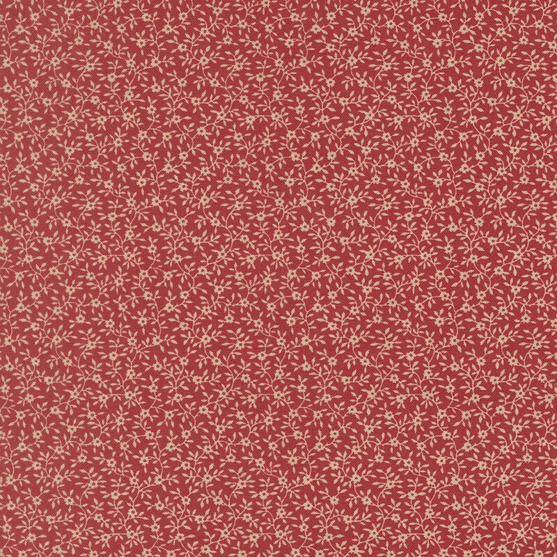 Watermelon red fabric with a dense pattern of beige vines and flowers