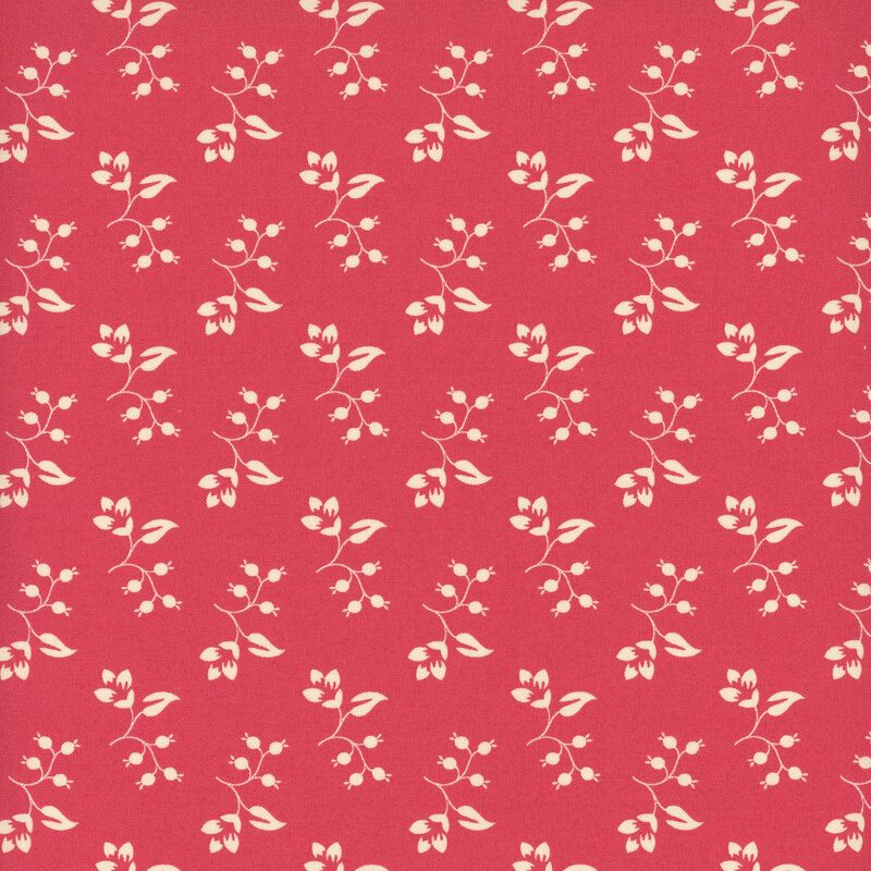 Watermelon red fabric with tossed beige floral stems.