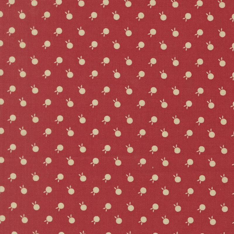 Cherry red fabric featuring beige polka dots with bunny ears