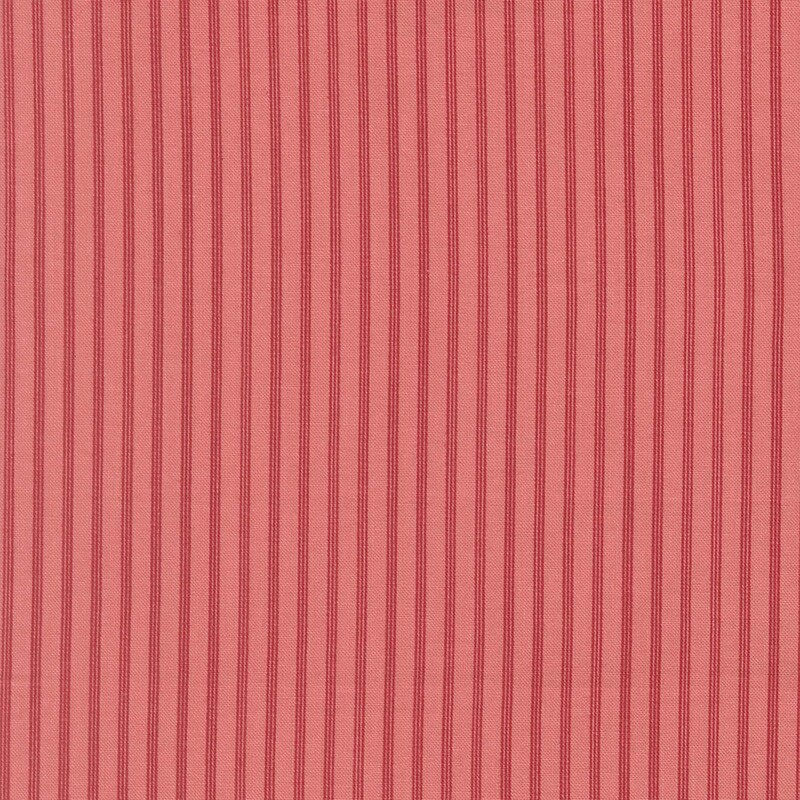 Vertical ticking stripes in watermelon red on salmon pink fabric 