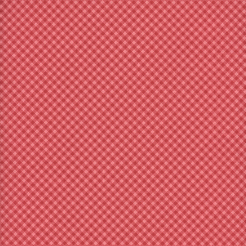 Pink fabric with a small, cherry red diagonal gingham. 