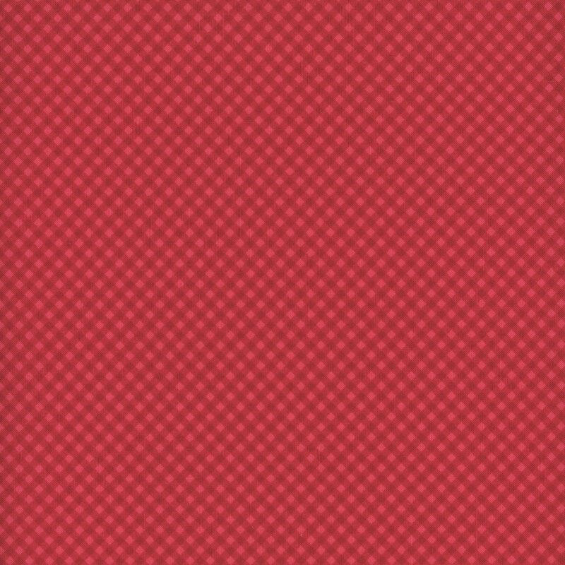 Watermelon red fabric with a small, crimson diagonal gingham. 