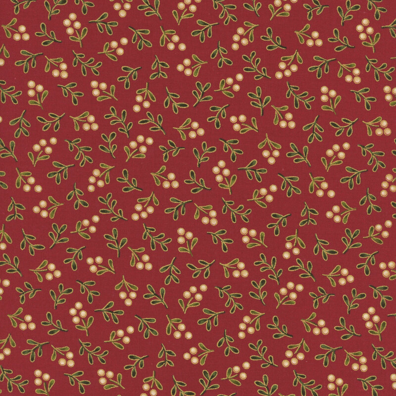 Delicate holly sprigs with gold metallic accents tossed on a deep red background.