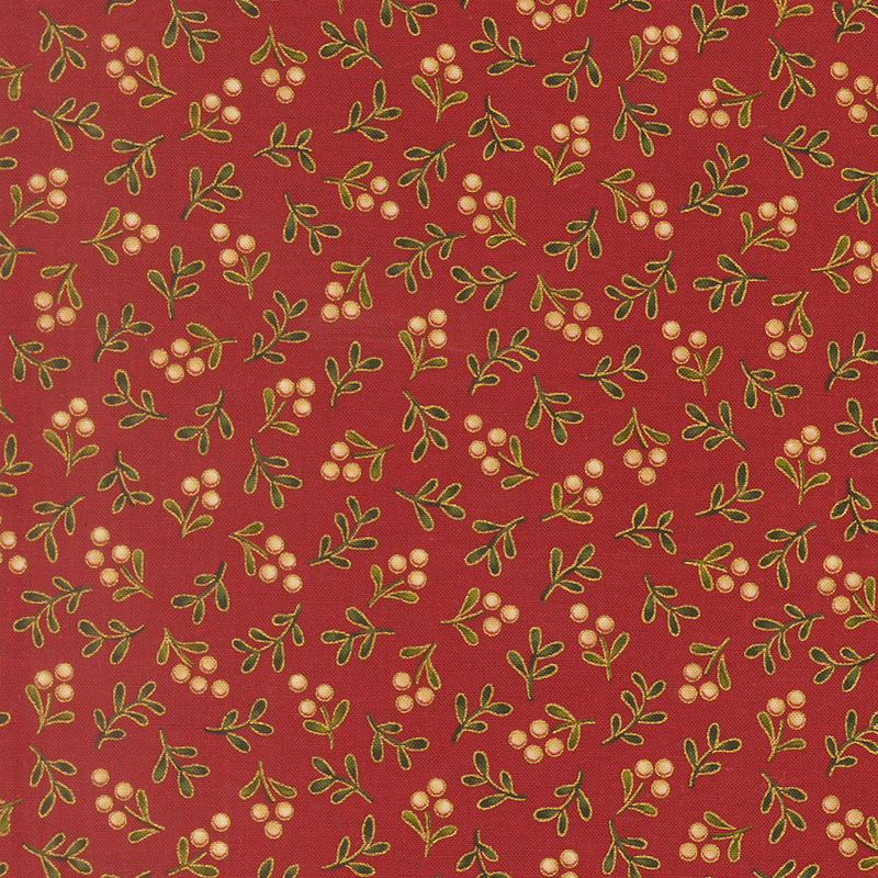 Delicate holly sprigs with gold metallic accents tossed on a deep red background.