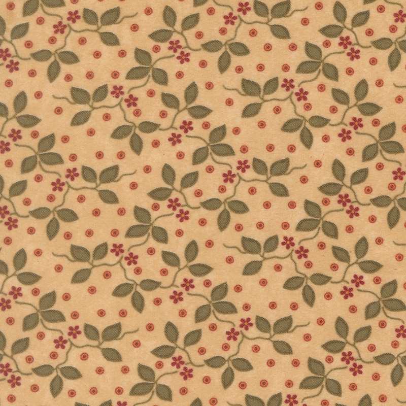 Tan flannel fabric featuring small red flowers and green vines on a dotted background.