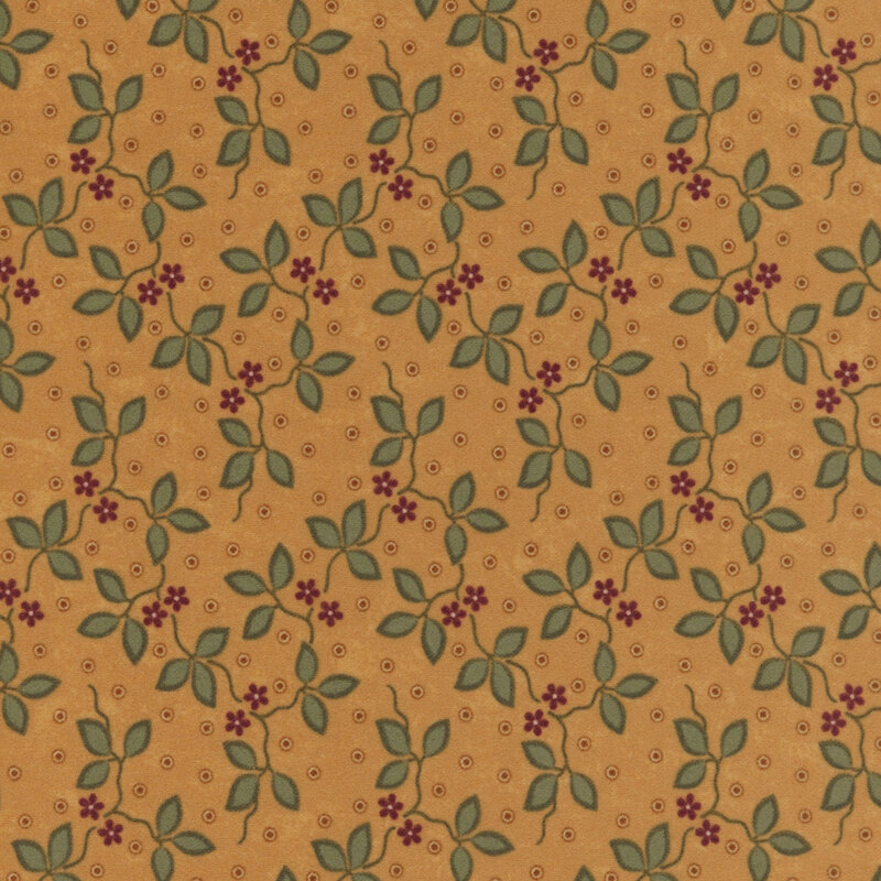Dark gold flannel fabric featuring small red flowers and green vines on a dotted background.