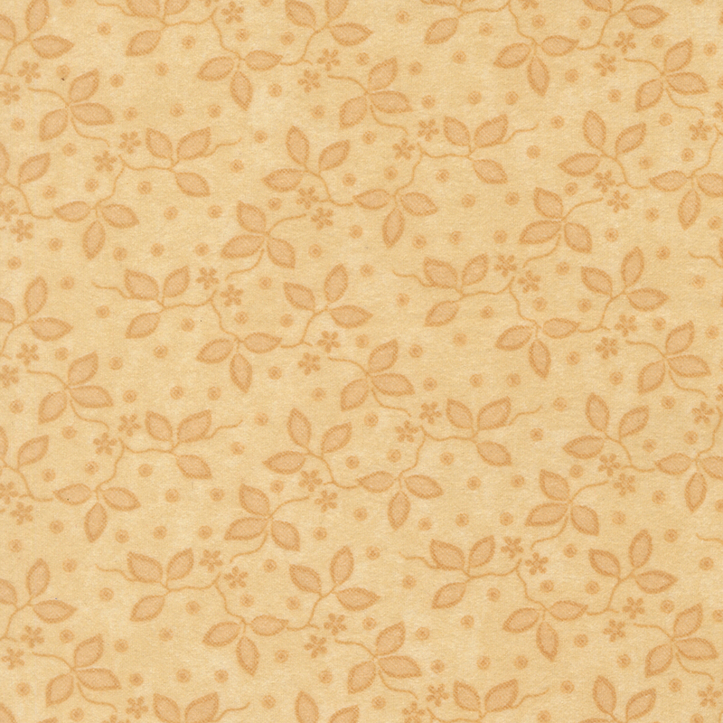 Tonal tan fabric featuring small flowers and vines.