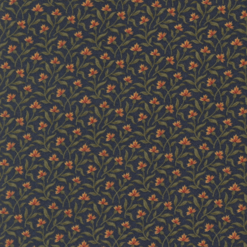 Navy flannel fabric tossed with delicate orange florals and thin leafy stems.