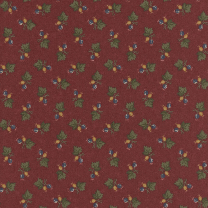 Auburn red flannel fabric featuring maple leaf and acorn sprigs.
