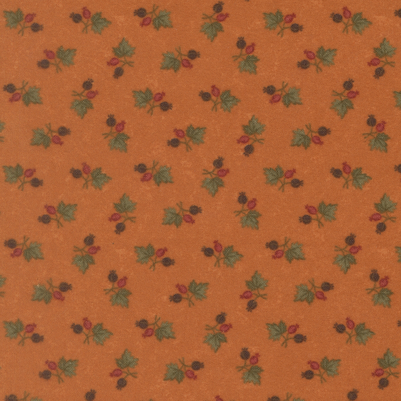 Dark orange flannel fabric featuring maple leaf and acorn sprigs.