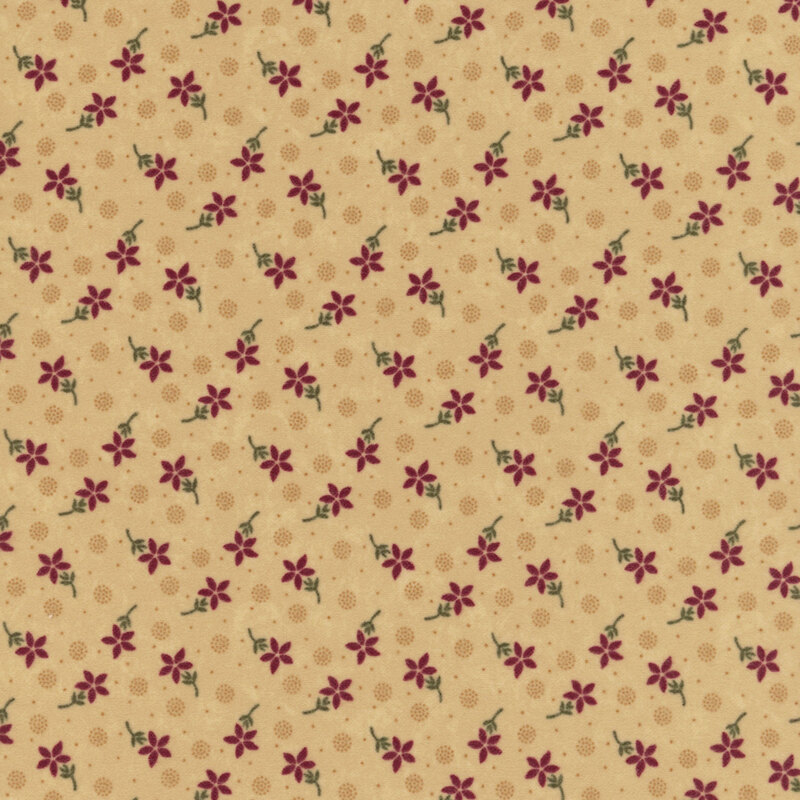 Flannel fabric featuring red flowers, pin dots, and pointillism circles tossed on a tan background.