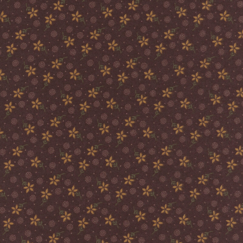 Flannel fabric featuring tan flowers, pin dots, and pointillism circles tossed on a mahogany background.