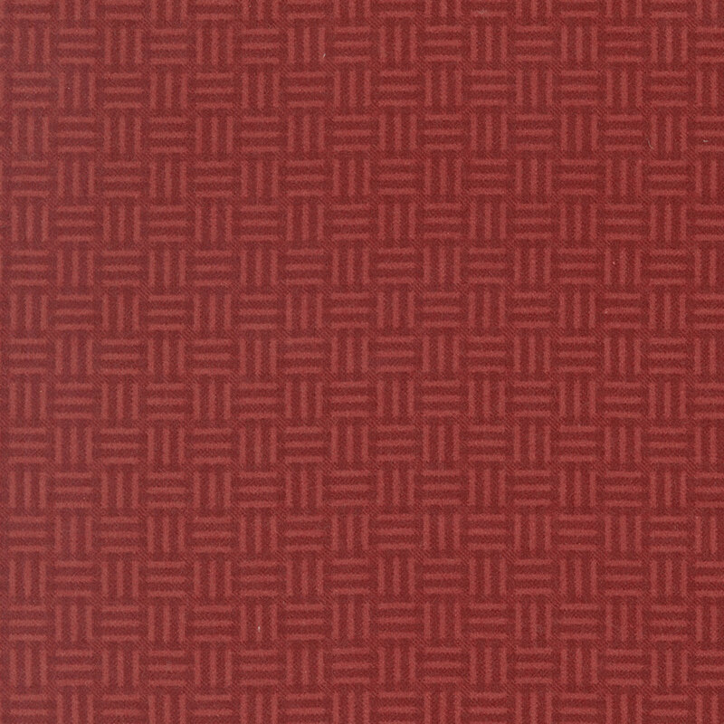 Tonal dark red flannel fabric featuring a basket weave pattern.