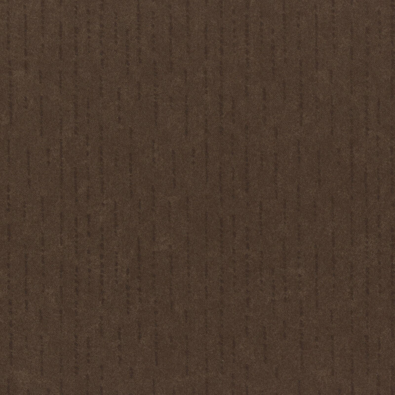 Tonal dark earth brown flannel fabric with dashed and dotted lines.