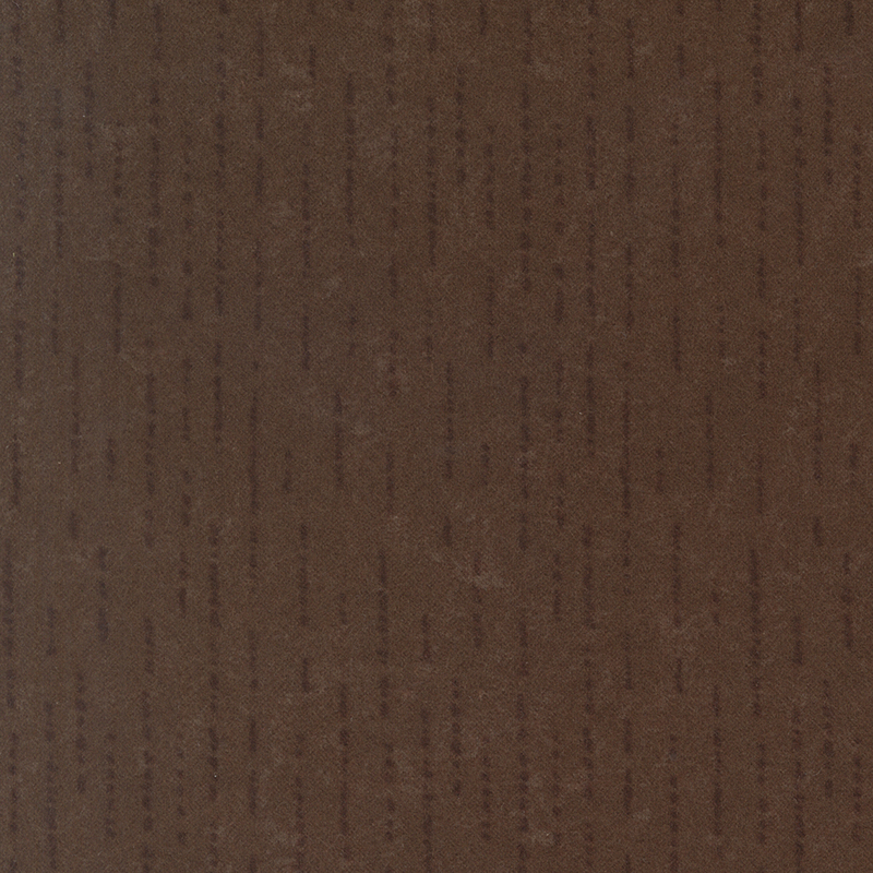 Tonal dark earth brown flannel fabric with dashed and dotted lines.