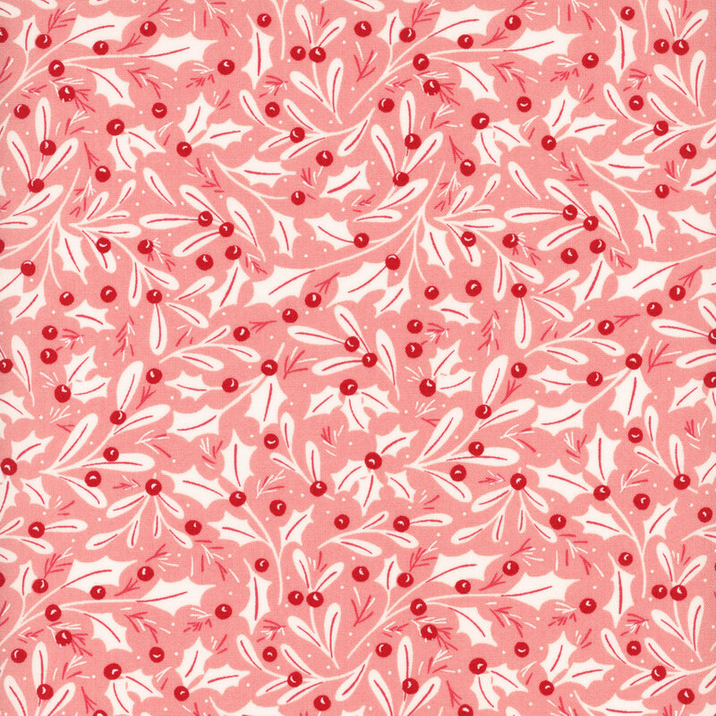 Salmon pink fabric with a pattern of white holly leaves and red berries, along with white mistletoe