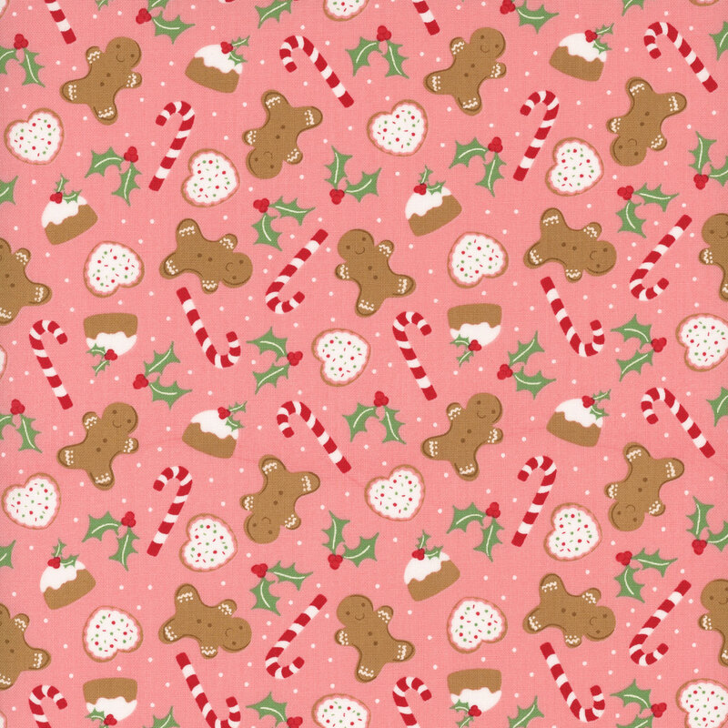 Salmon pink fabric with candy canes, holly leaves, gingerbread men, and other baked goods