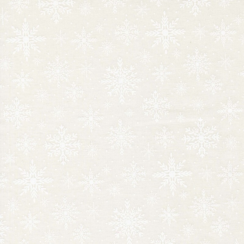 White-on-white fabric with a pattern of delicate snowflakes in various sizes