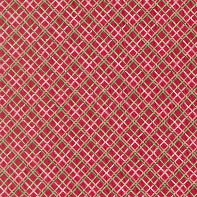 Christmas red fabric with a white, pink, and green diagonal windowpane plaid pattern