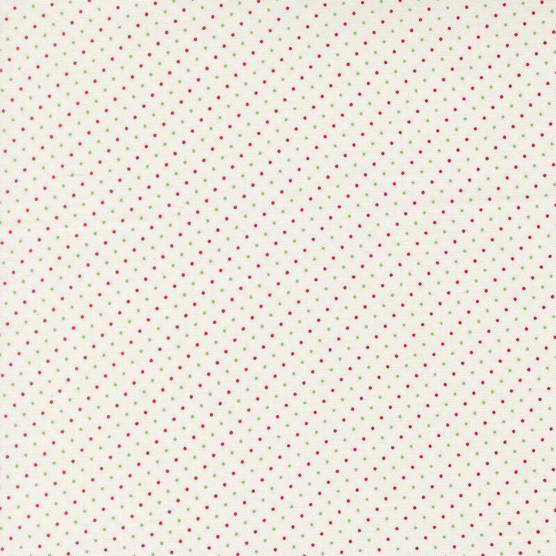 White fabric with a delicate pattern of pin dots in light green and red