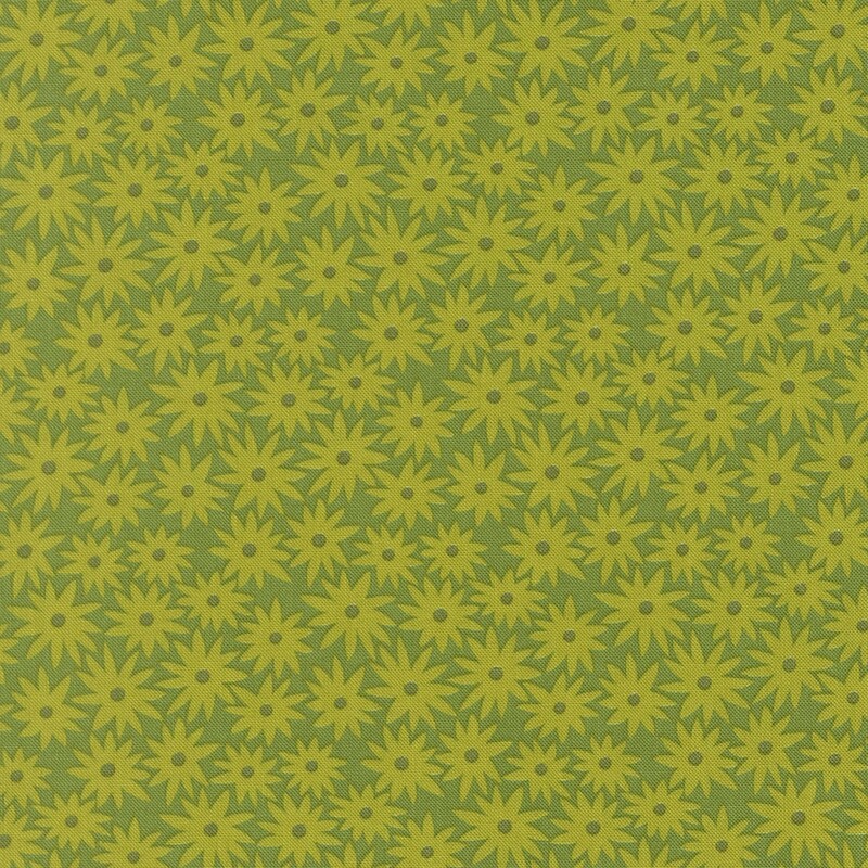 Grass green fabric with chartreuse daisies in a dense pattern