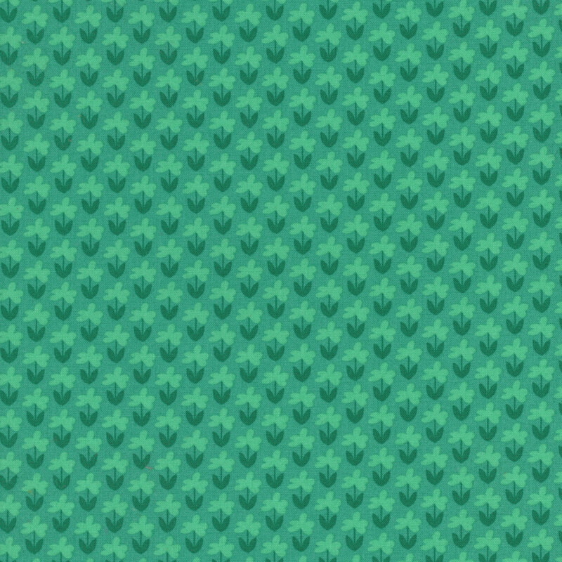 Bright jade fabric with a pattern of little mint green florals and teal stems