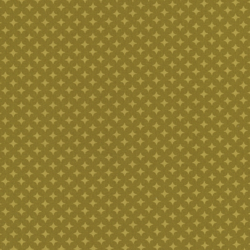 Olive green fabric with a geometric pattern of yellow-green diamonds 