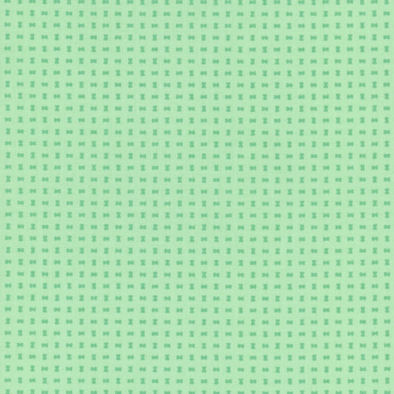 Small jade green hourglass shapes on a pistachio green background