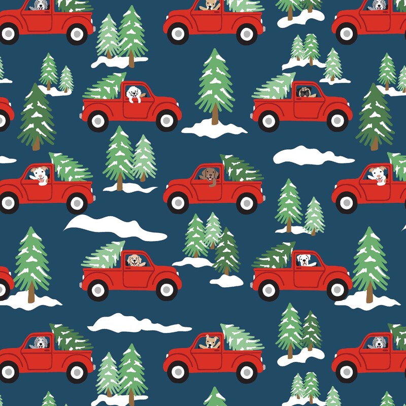 Indigo fabric with dogs driving red trucks carrying Christmas trees surrounded by snowy evergreen trees