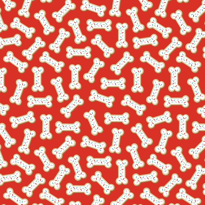 Scarlet fabric with dog bone shaped cookies with white frosting and rainbow sprinkles