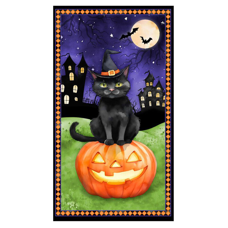 Fabric panel featuring a charming black cat, wearing a witch's hat, sitting on a pumpkin with haunted houses under a full moon.