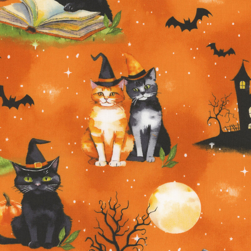 Mottled bright orange fabric featuring haunted houses, spooky trees, pumpkins, and cats wearing hats.