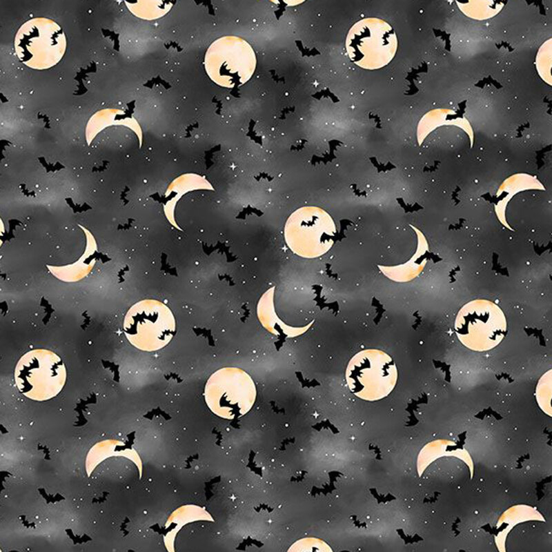 Bats, stars, and moons cover on mottled black fabric.
