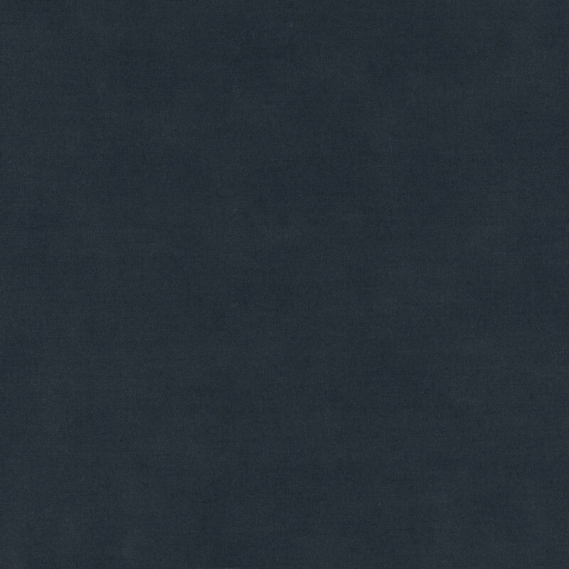A mottled deep midnight blue fabric 