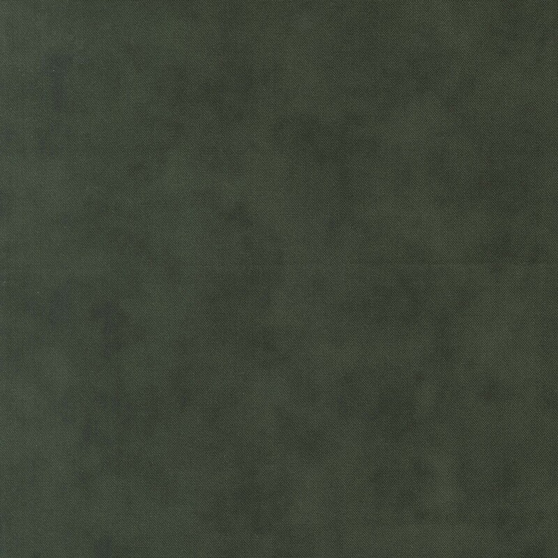 A mottled spruce green fabric 