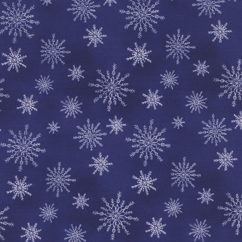 White snowflakes tossed on a mottled navy blue background.