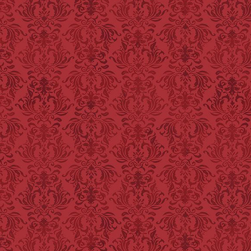 Red fabric with a tonal damask design.