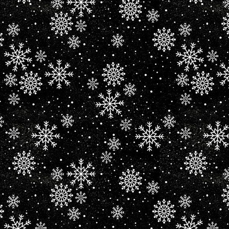 Delicate white snowflakes tossed on black fabric.