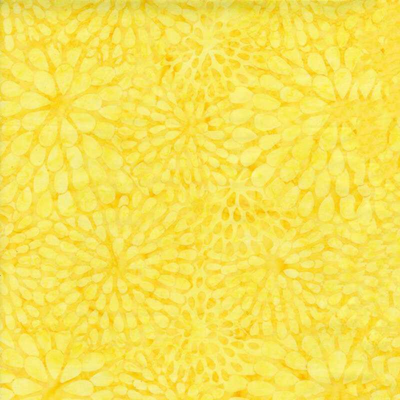 Tonal bright yellow fabric featuring a large floral blossom design.