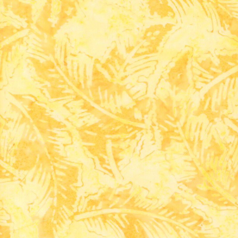 Bright tonal yellow fabric featuring tossed leaves.