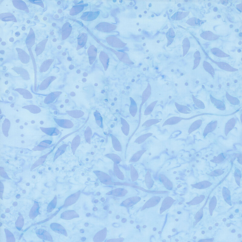 Tonal blue fabric featuring leafy branches on a mottled background.